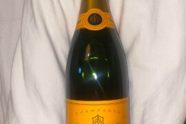 I have these bottles of veuve cliquot, can someone help me with how old these are/worth?