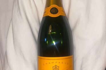 I have these bottles of veuve cliquot, can someone help me with how old these are/worth?