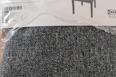 IKEA dining chairs... The arm chairs I bought are discontinued, so I can't buy the same covers as for the regular chairs...