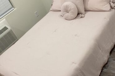 How dumb does this bedroom set look with the flooring? My mom said it matches too much and I can’t return it.