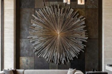 Modern luxury living room with statement sunburst wall art [1152×2048]