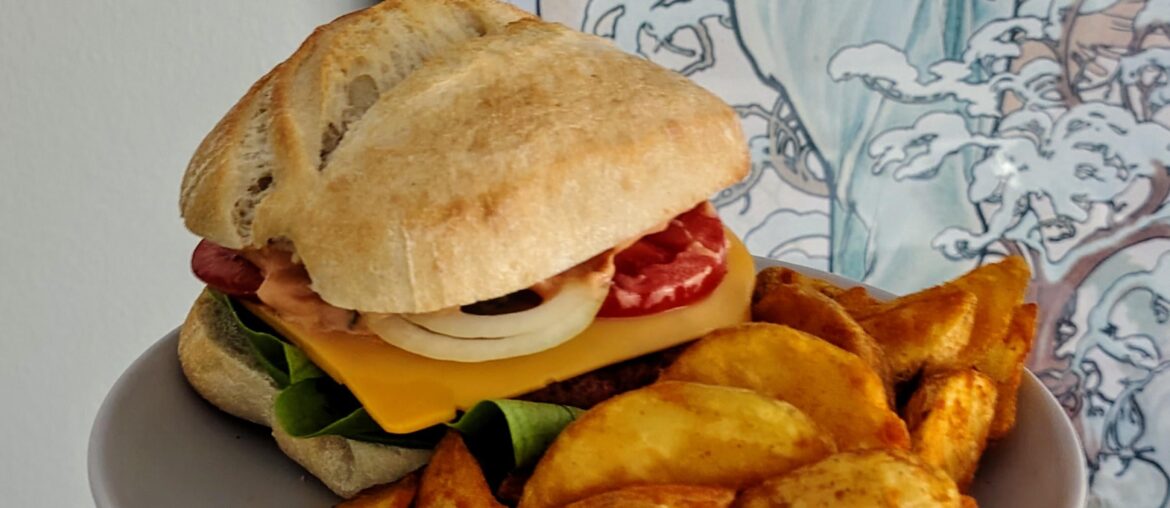 Veggie burger with potato wedges
