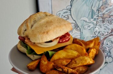 Veggie burger with potato wedges