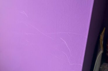 Marks on darker painted walls