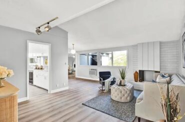 Buying a new house and I need help with our oddly shaped formal living room. This is the first thing you see when you walk in the front door. These photos show how it was staged, but it feels awkward to me. I’d love some fresh ideas on how to make the space flow better!