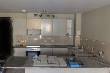 Something is wrong with the wall, cabinets and backsplash