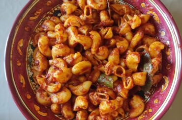 How about some simple vegetarian Tunisian pasta: tomato sauce, garlic and bay leaves or garnished with broad beans?