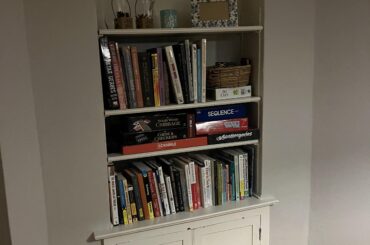 How can I decorate this bookshelf?