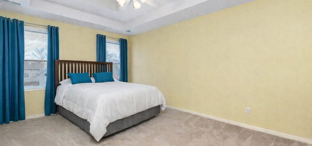 Could someone help me with a bedroom color? I would like to keep the curtains, pillows and bedspread the same but a good matching wall color.
