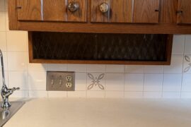 What’s the purpose of these vintage small storage spaces with glass sliding doors?