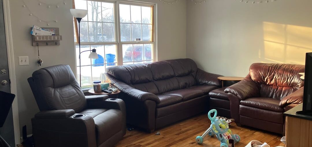 I realize I have a lot of mismatch furniture and clutter currently but what color/style curtains would look best to tie this room together