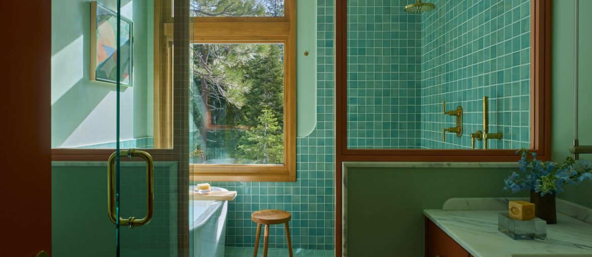 Main bathroom full of natural light and a glass partition in a renovated 1964 Mid-century modern Tahoe residence, Alpine Meadows, California [2880x1921]