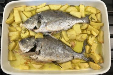 Baked orate with potatoes