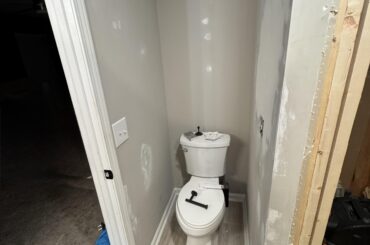 Toilet paper holder placement