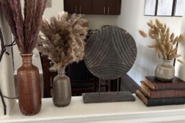 I decorated this little space in the entry way of my apartment. Is the grass a bit much?