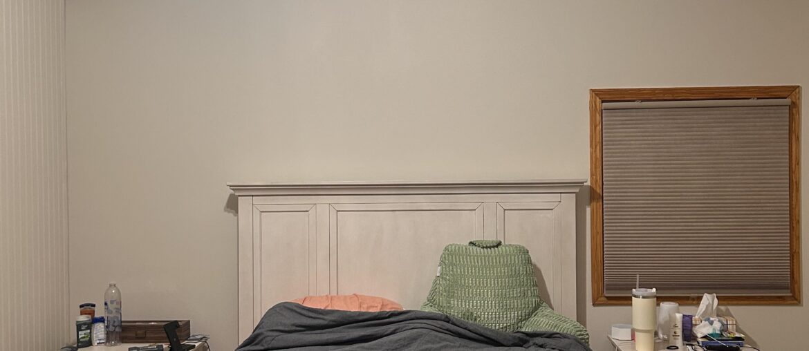 What would you do with the wall above our bed given its lack of symmetry?