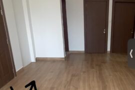 Little area behind entrance door how to design it?