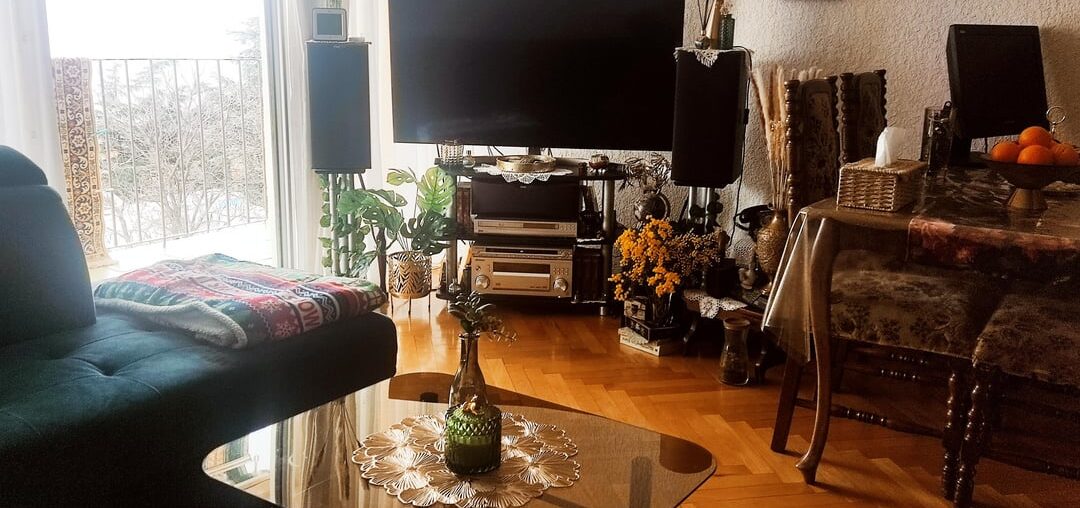 I have just finished decorating my living room and would love your honest opinion. How would you call this style, and do you have any suggestions for additions or changes? Thanks!