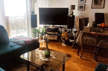 I have just finished decorating my living room and would love your honest opinion. How would you call this style, and do you have any suggestions for additions or changes? Thanks!