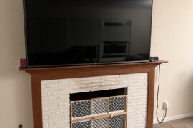 Any ideas to cover that huge TV?