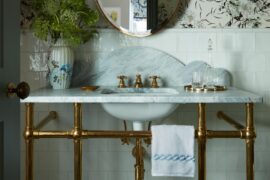 Not my bathroom, but this vintage-style sink and navy tile is perfection.