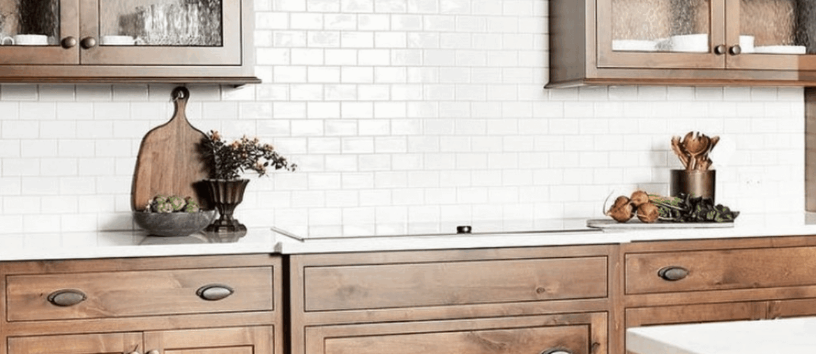 Love it or hate it? Custom range hood in a warm wood kitchen!