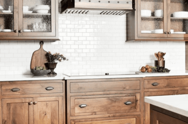 Love it or hate it? Custom range hood in a warm wood kitchen!