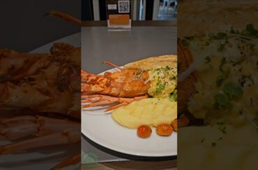 Trying the luxurious Lobster Thermidor 🦞🔥