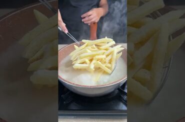 Crispy fries with flour in hot oil