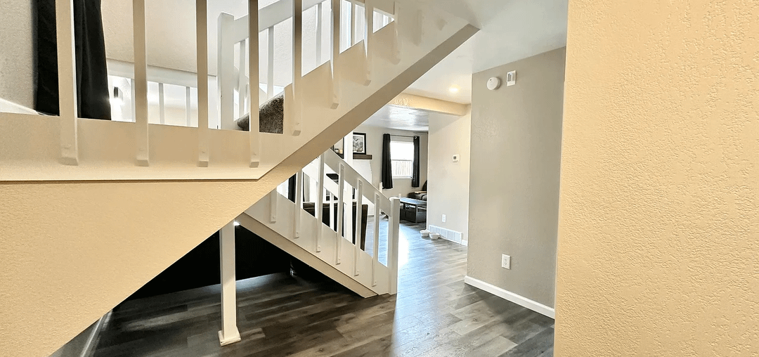 Black/Grey/White/Beige + Emerald/Birch/Clementine/Mustard/Sage and Tall window on stair landing Help on a tight budget.