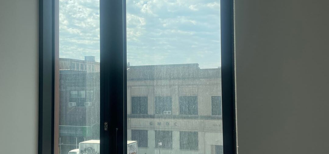 How to hang curtains on this big bedroom window next to wall