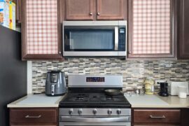 Added Gingham to plain brown cabinets. What do we think?