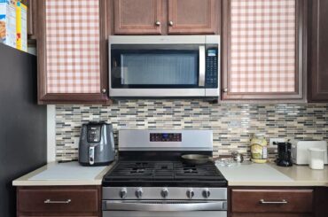 Added Gingham to plain brown cabinets. What do we think?