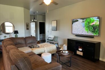 What color would you paint my walls? I want to keep it as bright as possible. I love natural lighting and a bright house. But also over the gray. (I know I need a rug!)