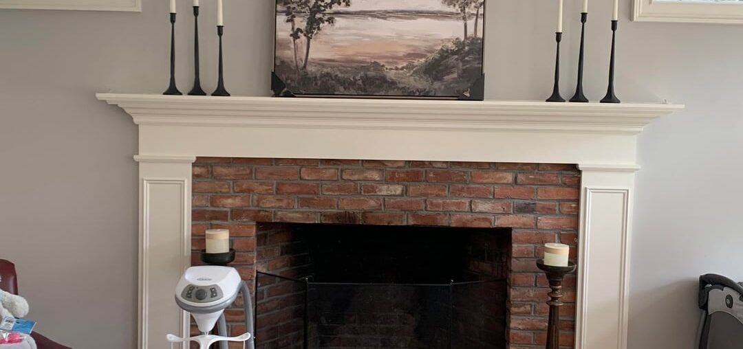 Does the fireplace mantle decor fit this room?