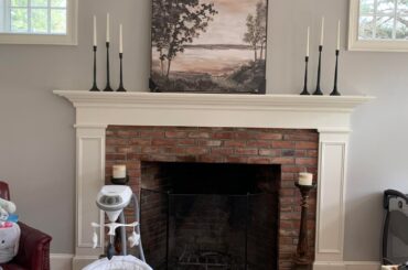 Does the fireplace mantle decor fit this room?