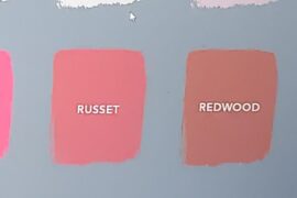 What paint colour can go with a black feature wall and smoked oak furniture?