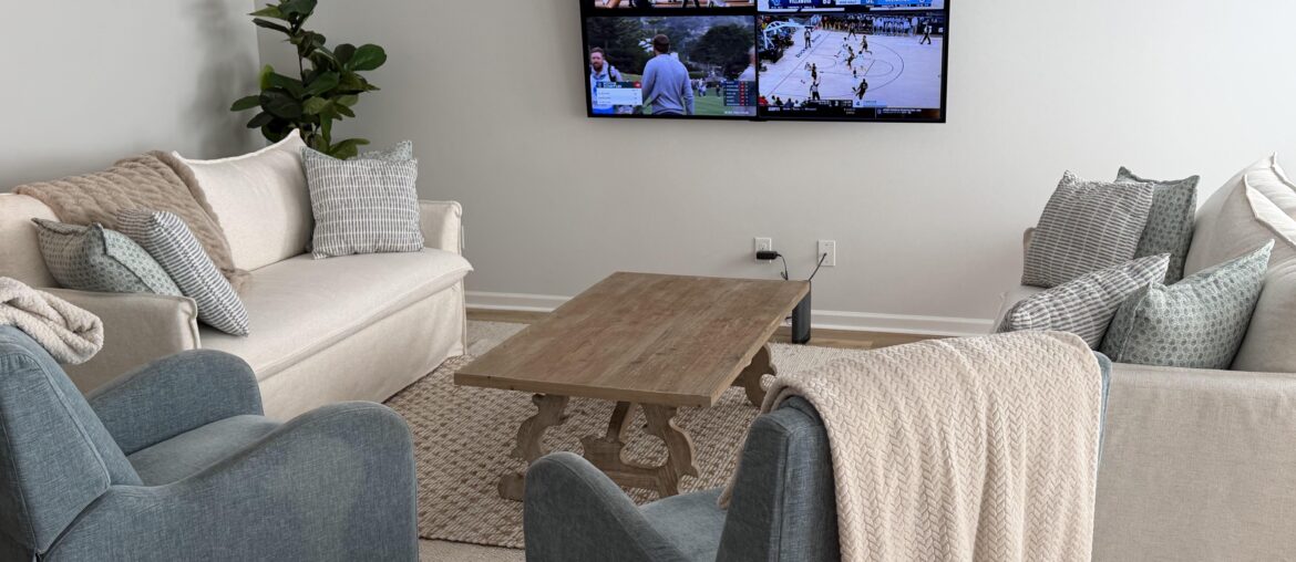 Would putting a fireplace TV console under this TV be tacky? It just solves the issue of not having a fireplace. Any pics of tasteful ones?