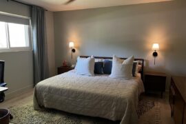 Can anyone tell me if this would look better with navy bed spread and curtains?