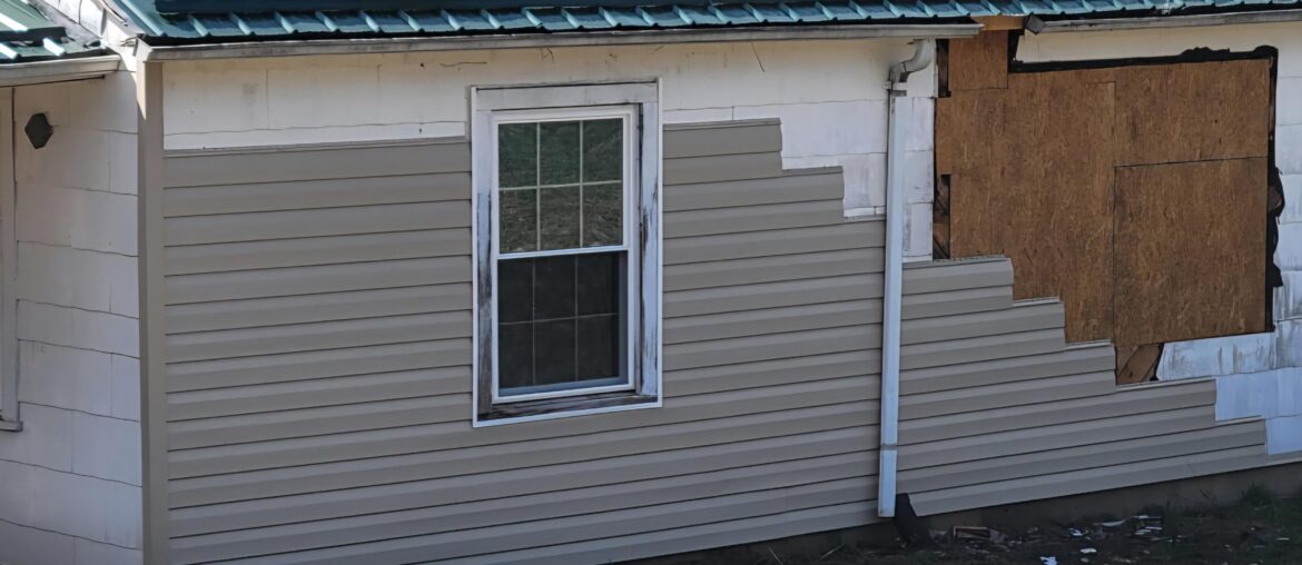 Started putting new siding over asbestos siding today…what do you think of this “tan” color along with the roof color? (Roof isnt done yet)…also, shutter color recommendation? Started putting new siding over asbestos siding today...what do you think of this "tan" color along with the roof color? (Roof isnt done yet)...also, shutter color recommendation?