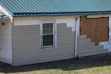 Started putting new siding over asbestos siding today...what do you think of this "tan" color along with the roof color? (Roof isnt done yet)...also, shutter color recommendation?