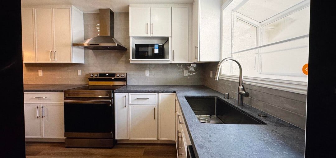 Tried fixing the lighting in this kitchen photo,does this look natural or overdone?