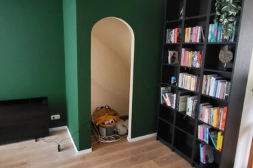 We just moved in here, and have this interesting arch that leads to a storage space. We would like to cover it up, cause we want to store things like vaccuums and other stuff we dont want to see. Suggestions are welcome :)