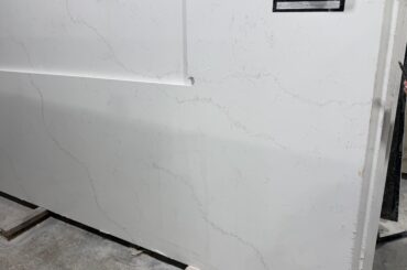 Can I get some opinion on the look of this quartz vein for a countertop? Does it look basic, cheap, decent, or?