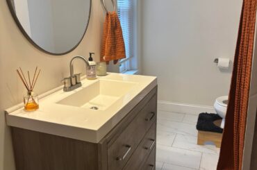 Planning a mild renovation of this bathroom but I'm having a hard time with this vanity