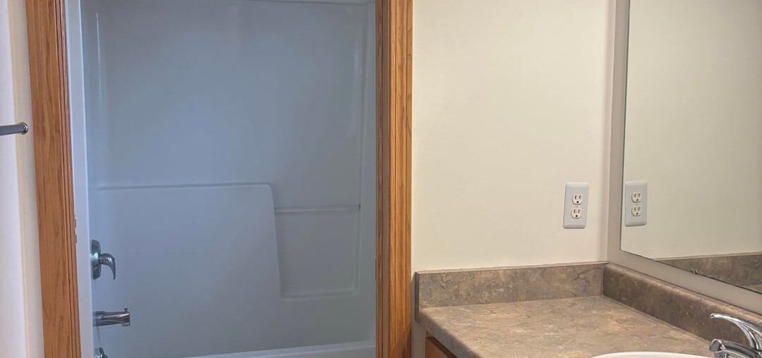 How would you redesign this sad en-suite bathroom?