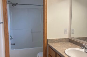 How would you redesign this sad en-suite bathroom?