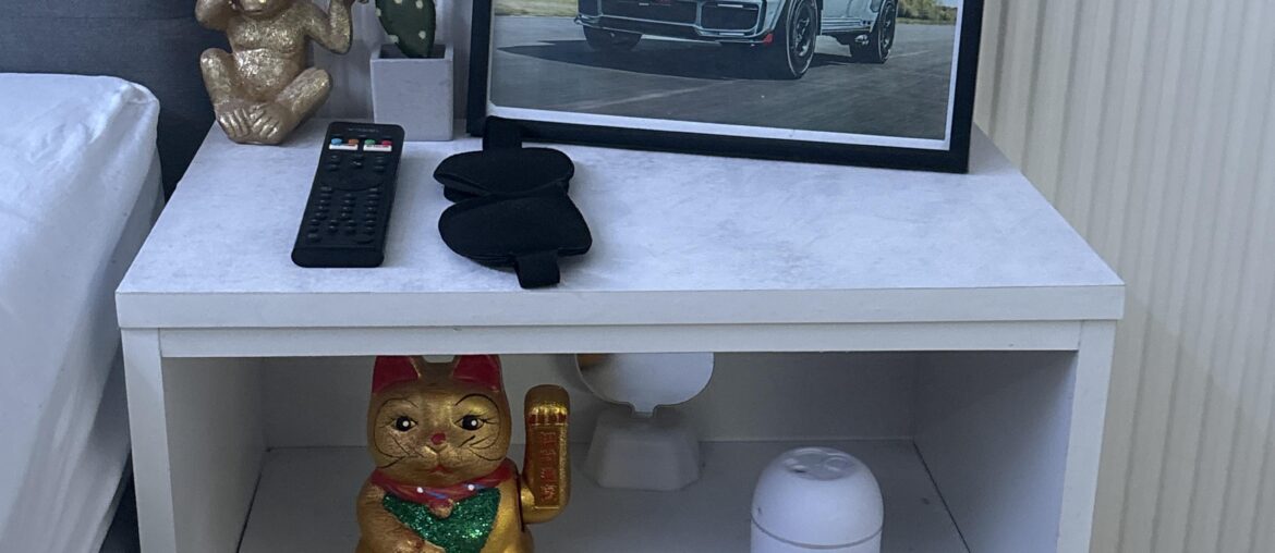 I need help with decorating this nightstand and the shelfs it needs to be white themed!