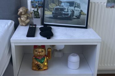 I need help with decorating this nightstand and the shelfs it needs to be white themed!
