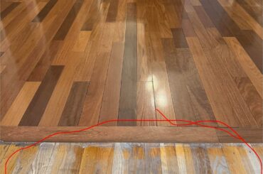 I need help choosing a stain color for the two circled rooms. Would you try to match the middle room (knowing it won’t be an exact match) or go with a contrasting color and pretend it was intentional?